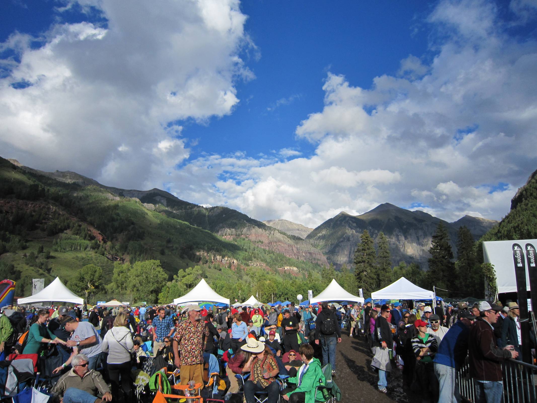 Telluride Blues & Brews Festival crowd beneath the Telluride box canyon