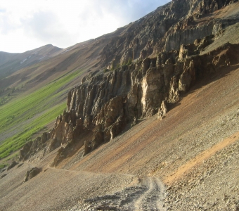 Ophir Pass Road traversing a steep rocky mountainside near Ophir, Colorado