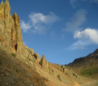 Rock spires and rugged slopes along Ophir Pass Road near Ophir, Colorado