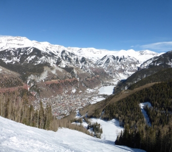 Looking down Milk Run toward the town of Telluride and the San Juan Mountains.