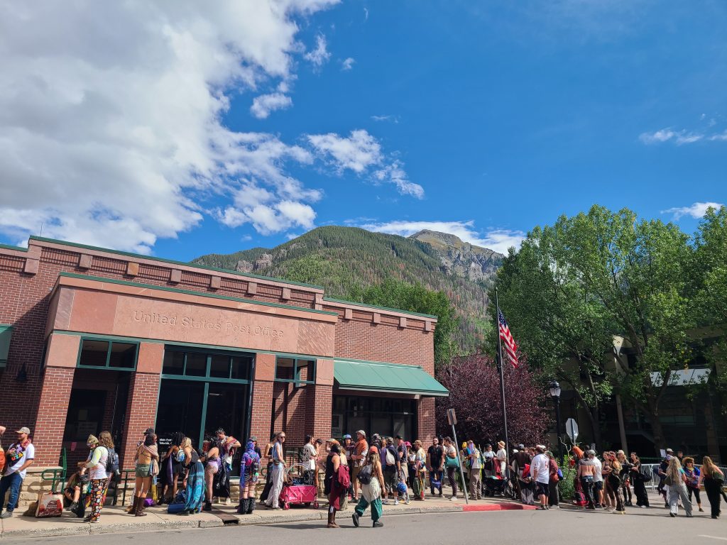 Camp Alderwild 2026 entry line near the Telluride Post Office